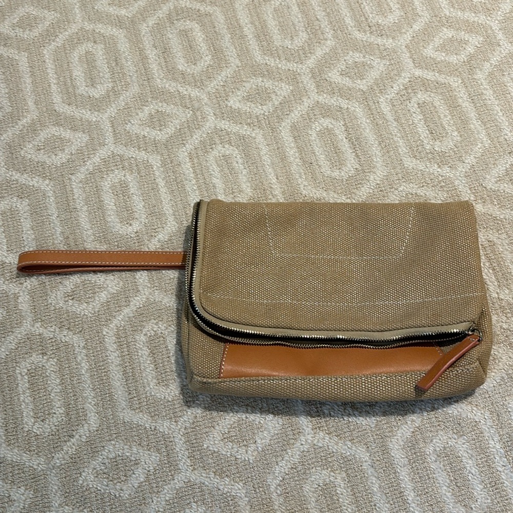 Natural, tan and gold tone clutch
